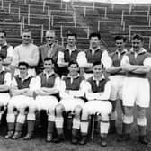 John Ogilvie is third from right in the back row of the Hibs team picture from the 1950-51 season. Picture: Colorsport Shutterstock