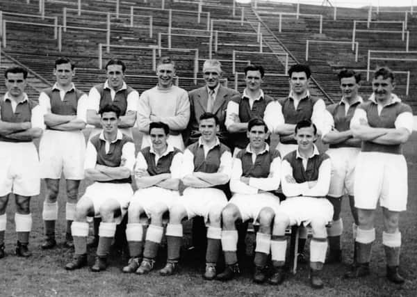 John Ogilvie is third from right in the back row of the Hibs team picture from the 1950-51 season. Picture: Colorsport Shutterstock