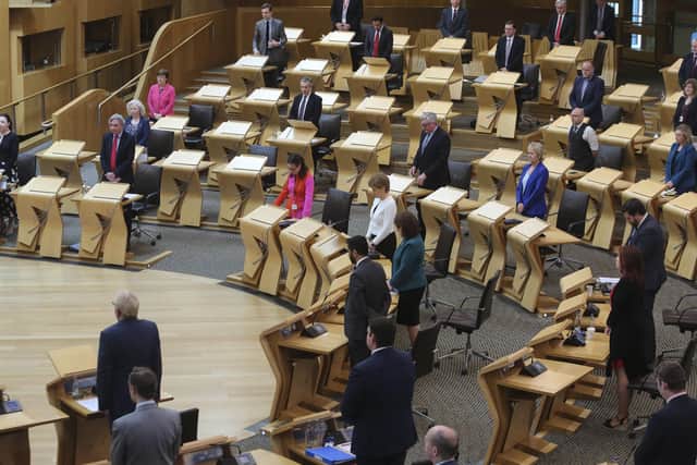 MSPs observe a minute's silence to mark the 75th anniversary of VE Day before Covid-19 social distancing First Minister's Questions at the Scottish Parliament. Picture: Fraser Bremner/Scottish Daily Mail/PA Wire
