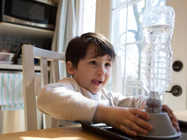 You can recreate a tornado at home, using everyday items from your kitchen, like this little boy