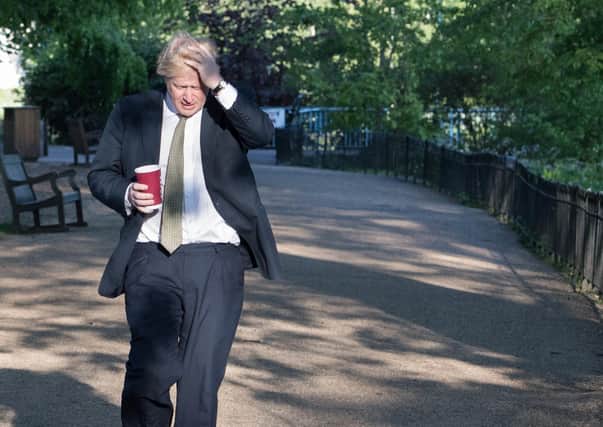 Prime Minister Boris Johnson takes a morning walk in St James's Park in London. Picture: PA