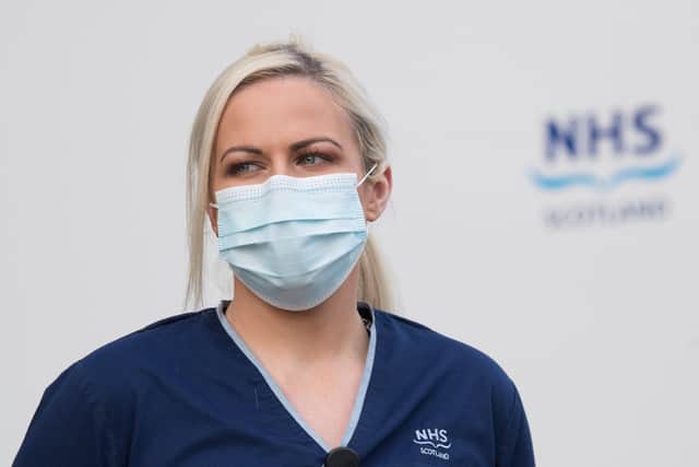 A NHS nurse wearing a face mask. Picture: John Devlin
