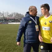 Real Kashmir manager David Robertson and his son Mason, who plays for the club, leave the pitch after winning their I-League match against Chennai City in Srinagar in January 2019. Picture: Tauseef Mustafa/AFP via Getty Images