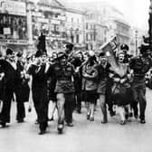 Rejoicing crowds in Piccadilly, London, on VE Day, 1945