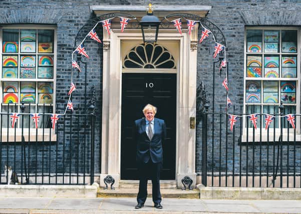 Boris Johnson outside No 10 Downing Street on VE Day. Picture: 
Peter Summers/Getty