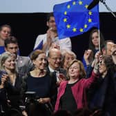 Nathalie Loiseau (C) waves a European flag during a public meeting ahead of the European elections. Picture: Getty