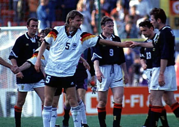 Pat Nevin, second from the right, cuts a dejected figure after Scotland's 2-0 defeat by Germany at Euro 92 in Sweden. Picture: SNS