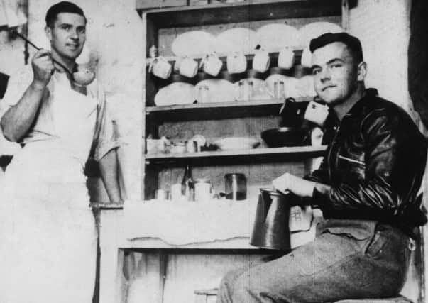 British prisoners-of-war in a kitchen at Camp Stalag XXI in Poland, during World War II, 1941. Picture: Getty