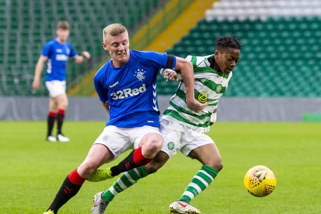 Celtic's Karamoko Dembele competes with Rangers' Reece Breen in a reserve team clash. Picture: SNS