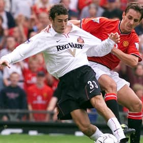 Manchester United’s Gary Neville  tackles Sunderland’s Julio Arca during a match at Old Trafford in 2000. Picture: PA