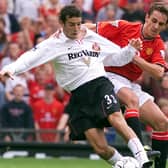 Manchester United’s Gary Neville  tackles Sunderland’s Julio Arca during a match at Old Trafford in 2000. Picture: PA