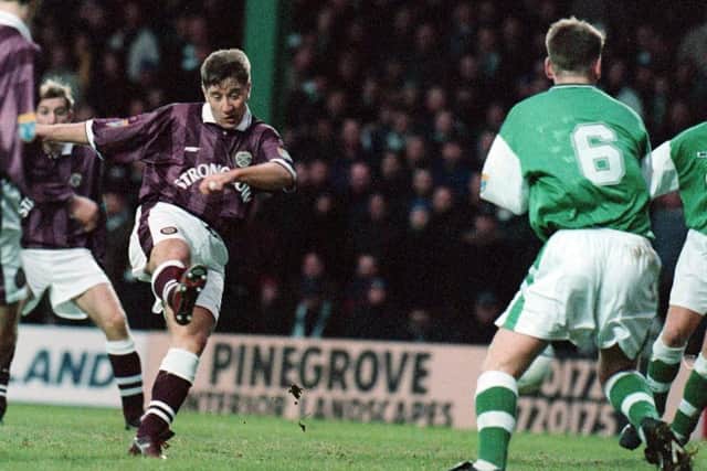 John Robertson scores one of his 27 goals for Hearts against Hibs.