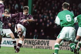 John Robertson scores one of his 27 goals for Hearts against Hibs.
