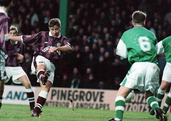 John Robertson scores one of his 27 goals for Hearts against Hibs.