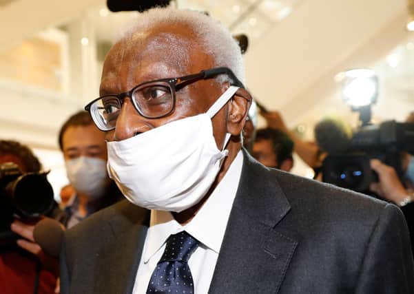 Former IAAF president Lamine Diack wears a protective mask as he arrives at the courthouse in Paris for the start of his trial. Picture: Thomas Samson/AFP