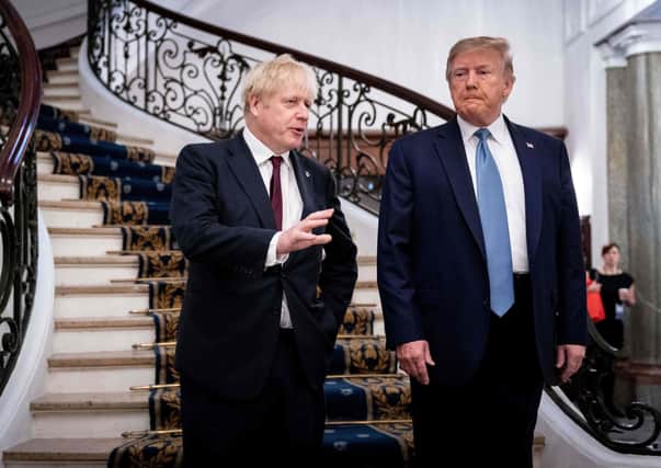 As honest as each other? Donald Trump and Boris Johnson at the G7 Summit in France in August last year. (Picture: Erin Schaff/pool/ AFP/Getty Images