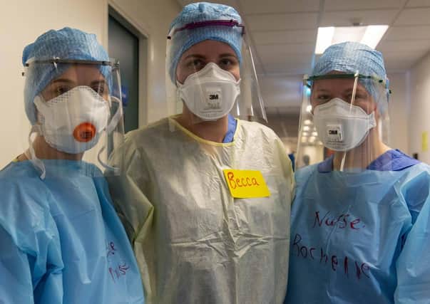 Medical staff wearing PPE safety equipment at Edinburgh Royal Infirmary. (Picture: Andy O'Brien)