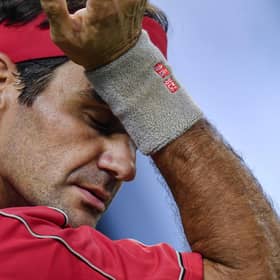 Men's Grand Slam singles record-holder Roger Federer said he would be sidelined until 2021 after undergoing keyhole surgery on his right knee. Picture: Hector Retamal/AFP via Getty Images