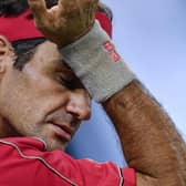 Men's Grand Slam singles record-holder Roger Federer said he would be sidelined until 2021 after undergoing keyhole surgery on his right knee. Picture: Hector Retamal/AFP via Getty Images