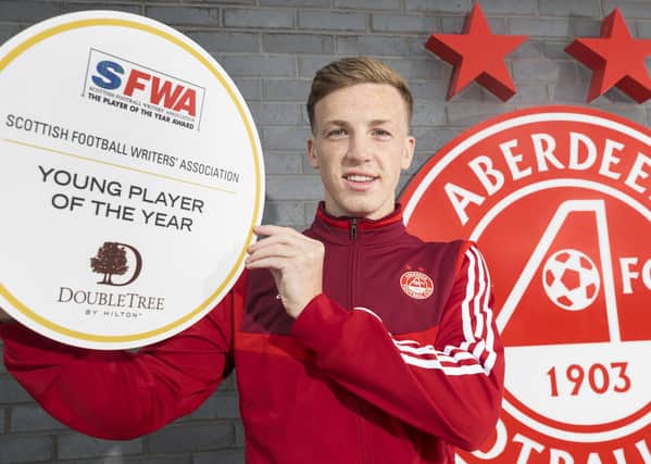 Aberdeen midfielder Lewis Ferguson says the Pittodrie club can match his ambition. Picture: Steve Welsh