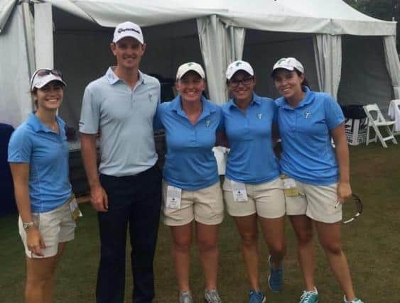Gemma Dryburgh, third from left, is pictured with Justin Rose when she was a volunteer at the Zurich Classic in New Orleans.