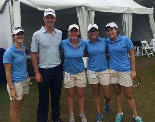 Gemma Dryburgh, third from left, is pictured with Justin Rose when she was a volunteer at the Zurich Classic in New Orleans.