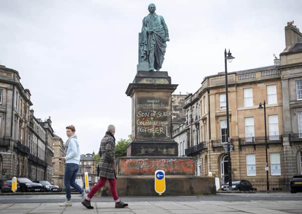 Graffiti that reads "Son of slaver and Colonialist Profiteer" has appeared on the statue of Robert Dundas 2nd Viscount Melville, son of Henry Dundas 1st Viscount Melville, in Melville Street, Edinburgh. Picture: Jane Barlow/PA Wire