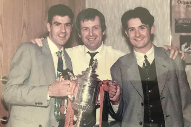Bill Littlejohn celebrates Dundee United's 1994 Scottish Cup final win with goalscorer Craig Brewster, left, and midfielder David Hannah, right.