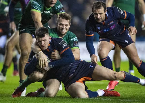 Edinburgh’s Matt Scott grounds the ball as a penalty try is awarded for a high tackle by Jack Carty of Connacht. Picture: SNS/SRU