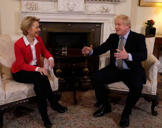Britain's Prime Minister Boris Johnson (R) speaks with European Commission President Ursula von der Leyen inside 10 Downing Street in central London on January 8, 2020, ahead of their meeting. - The EU's top official on Wednesday predicted "tough talks" with Britain on the sides' future relations after Brexit enters force after years of delays at the end of the month. "There will be tough talks ahead and each side will do what is best for them," European Council president Ursula von der Leyen said ahead of her first official meeting with Prime Minister Boris Johnson. (Photo by Kirsty Wigglesworth / POOL / AFP) (Photo by KIRSTY WIGGLESWORTH/POOL/AFP via Getty Images)