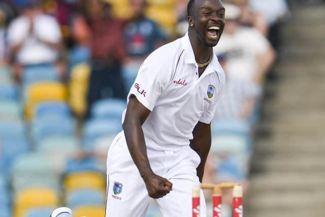 West Indies bowler Kemar Roach celebrates the dismissal of England's Jos Buttler during the first Test in Barbados in January 2019. Picture: Randy Brooks/AFP via Getty Images