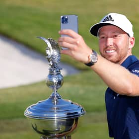 Daniel Berger takes a selfie with the trophy after winning the Charles Schwab Challenge in Fort Worth on Sunday. Picture: Getty.