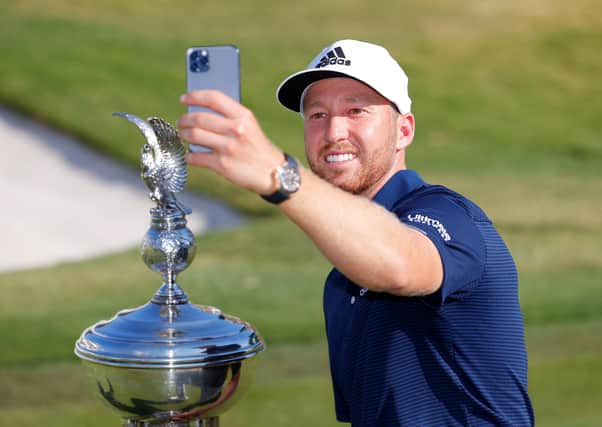 Daniel Berger takes a selfie with the trophy after winning the Charles Schwab Challenge in Fort Worth on Sunday. Picture: Getty.