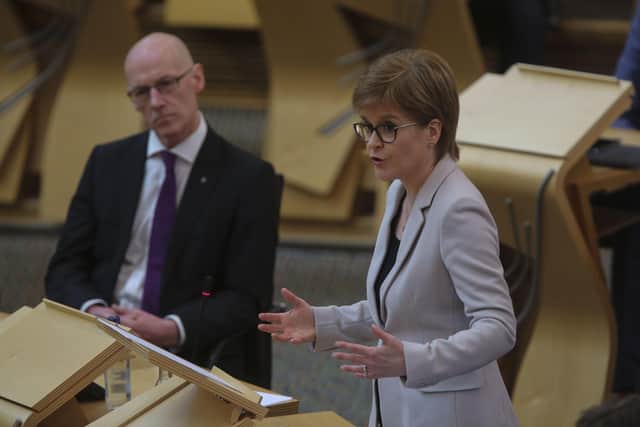 First Minister Nicola Sturgeon alongside Deputy First Minister John Swinney during First Minister's Questions at the Scottish Parliament. Picture: Fraser Bremner/Scottish Daily Mail/PA Wire