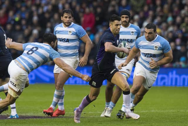 Adam Hastings bursts through the Argentina defence during the autumn Test in 2018. The SRU are hoping that this November’s match against the Pumas can still go ahead with fans in attendance. Picture: SNS
