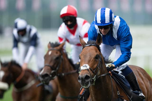 Jim Crowley rides Battaash, right, to victory in The King's Stand Stakes. Picture: Edward Whitaker/AFP
