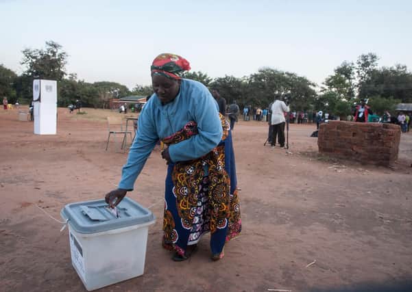 A woman casts her vote at the Malembo polling station in Lilongwe on Tuesday in a re-run of last year’s presidential election (Picture: Amos Gumulira/AFP via Getty Images)