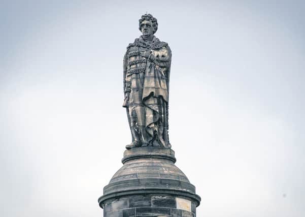 Henry Dundas on his column. Picture: Jane Barlow/PA
