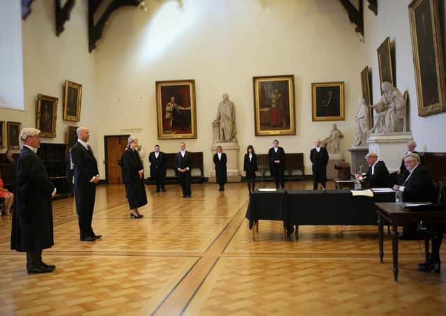 Faculty intrants observe social distancing at the calling ceremony in Parliament Hall. Picture: Victoria Young.
