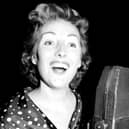 Dame Vera Lynn, who has died at the age of 103, pictured performing on BBC radio in 1956 (Picture: PA wire)