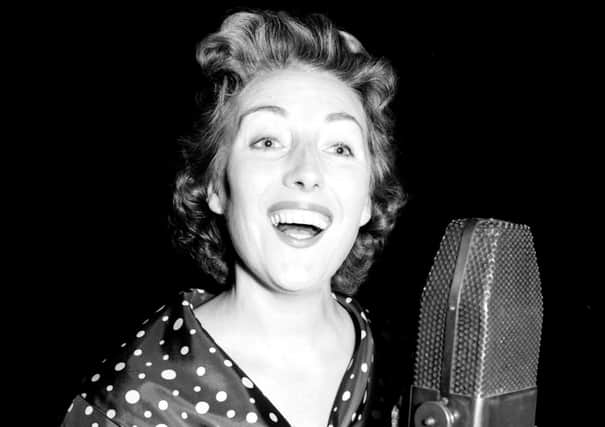 Dame Vera Lynn, who has died at the age of 103, pictured performing on BBC radio in 1956 (Picture: PA wire)