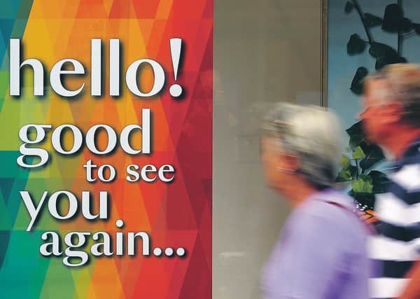 A Debenhams store welcomes returning customers. Picture: Andrew Matthews/PA