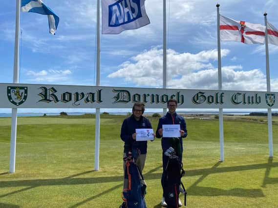 Bradley Smith and Calum Paterson undertaking their marathon event at Royal Dornoch on Saturday