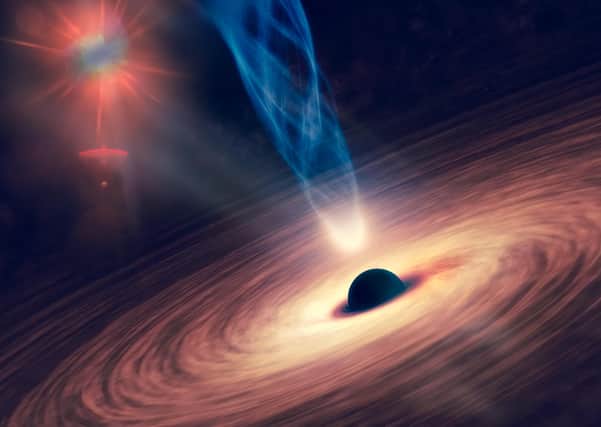 A black hole with nebula over colourful stars and cloud fields in outer space. Elements of this image were furnished by NASA