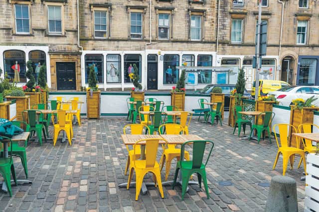 The beer garden area of Biddy Mulligan's is layed out in preparation for the pub's reopening