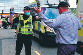 A tense stand-off during Wednesday's troubles in George Square. Picture: John Devlin