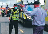 A tense stand-off during Wednesday's troubles in George Square. Picture: John Devlin