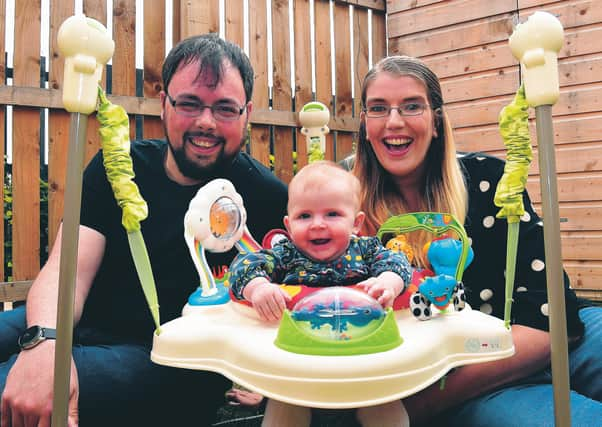 Charles and Caroline Ross with their 5 month daughter Amelia