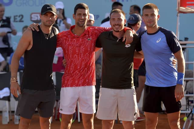 Novak Djokovic, second left, poses with Grigor Dimitrov, left, Viktor Troicki and Borna Coric, right, at the event in Zadar, Croatia. Picture: Zvonko Kucelin/AP