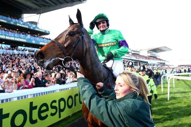 Mon Mome and jockey Liam Treadwell celebrate winning the 2009 John Smith’s Grand National. Picture: David Davies/PA Wire